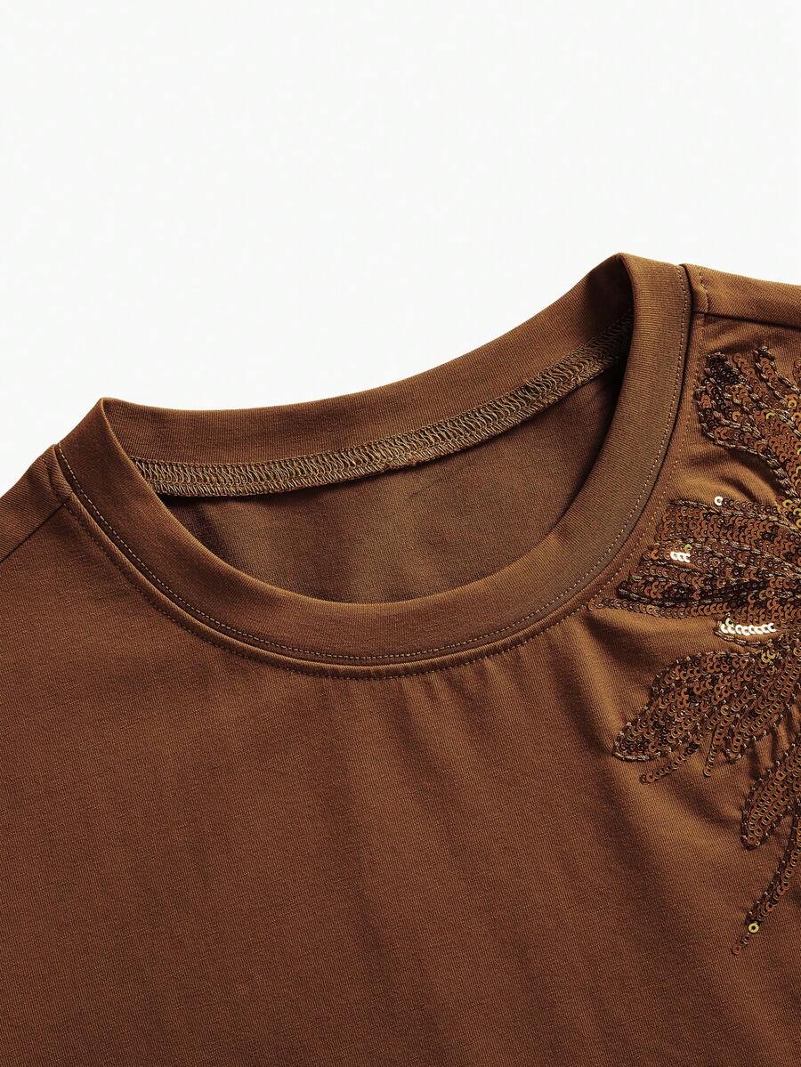 Blusa feminina castanha de algodão com bordado floral e paetês