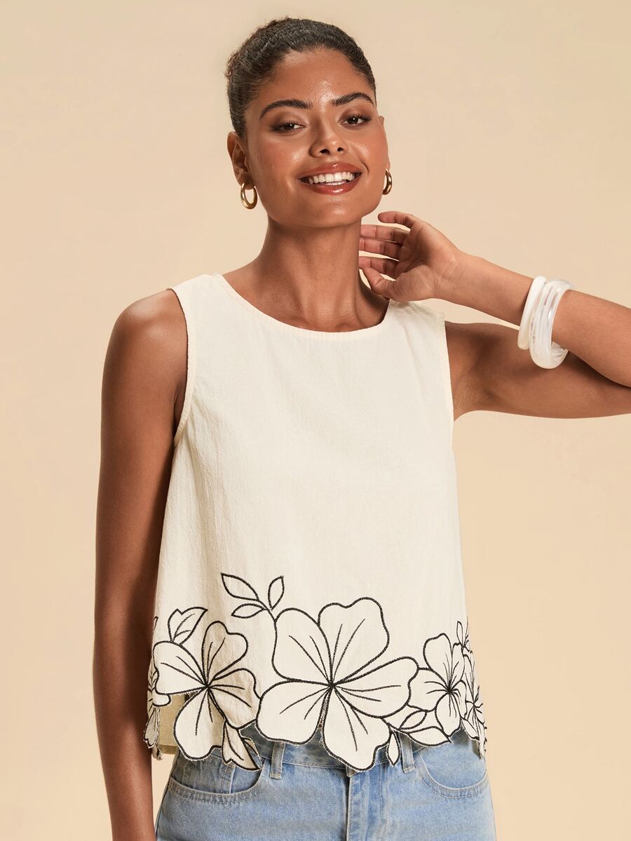 Blusa feminina com bordado floral e gola redonda para primavera e verão
