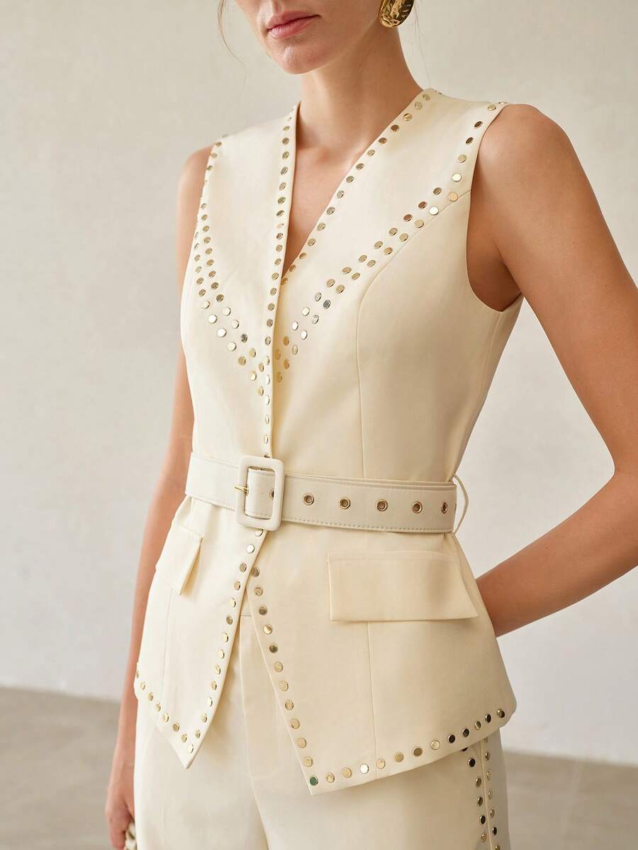 Conjunto feminino de alfaiataria com cinto e calça de pernas amplas
