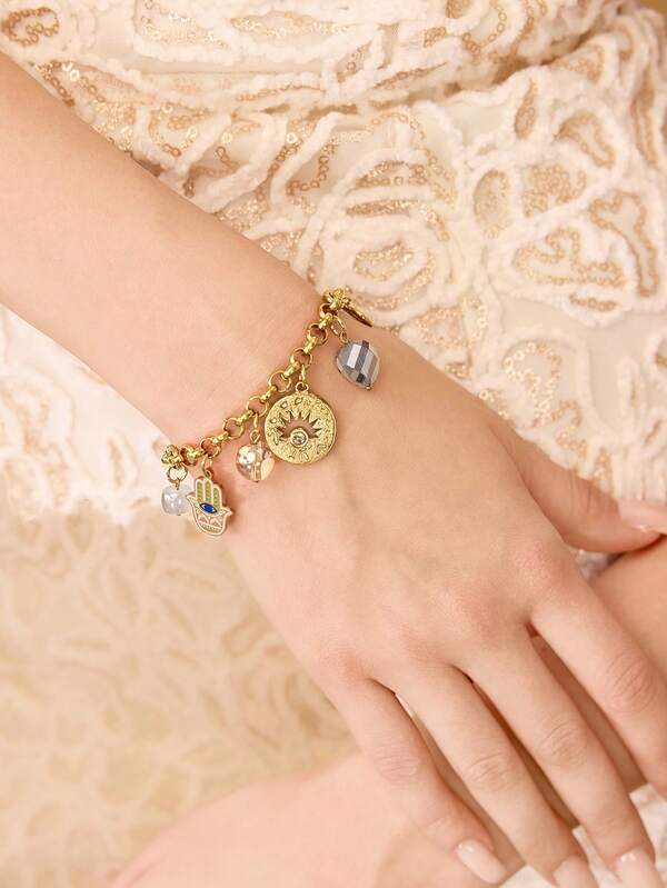 Pulseira Feminina Dourada com Charms Místicos em Aço Inox Banhada a Ouro 18 K - Semi Joia Fashion Premium - Boutique do Encanto Pulseiras