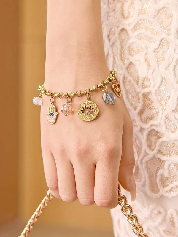 Pulseira Feminina Dourada com Charms Místicos em Aço Inox Banhada a Ouro 18 K - Semi Joia Fashion Premium - Boutique do Encanto Pulseiras