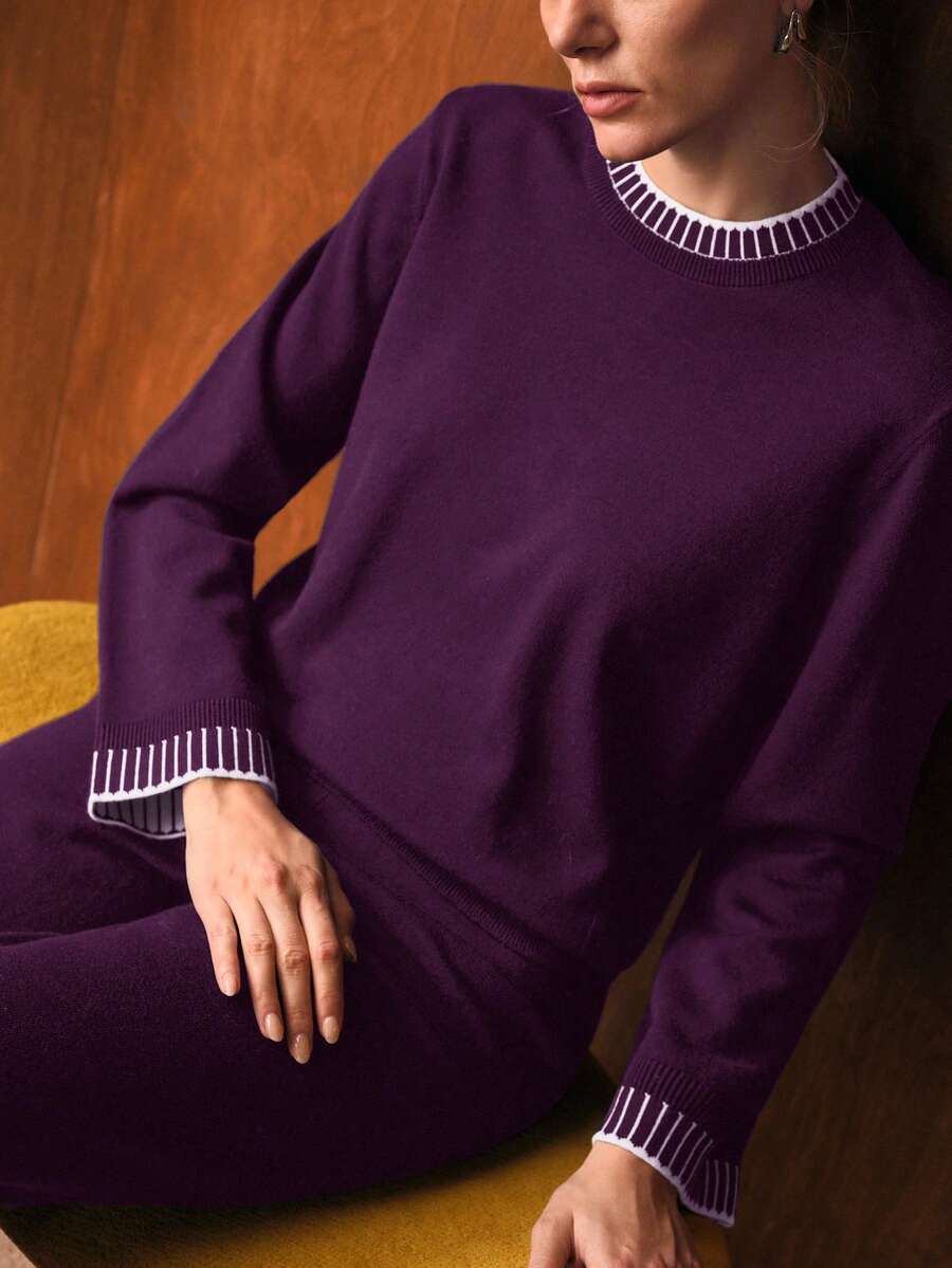 look feminino minimalista elegante com suéter e calça larga