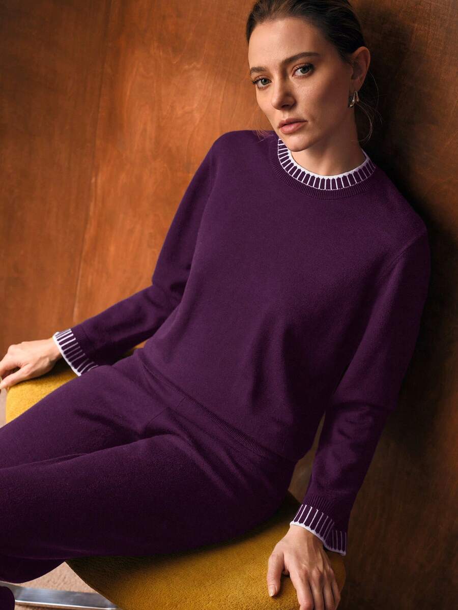 look feminino minimalista elegante com suéter e calça larga