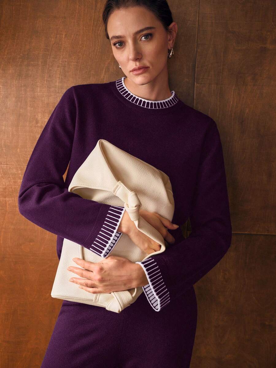 look feminino minimalista elegante com suéter e calça larga