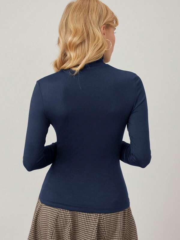 Blusa Feminina Malha Premium Slim Fit de Gola Alta | Coleção Outono-Inverno 2026 | Boutique do Encanto 