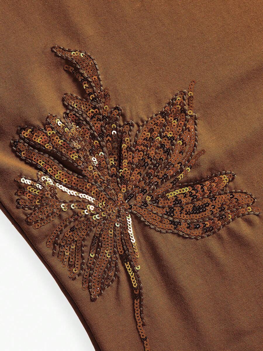 Blusa feminina castanha de algodão com bordado floral e paetês