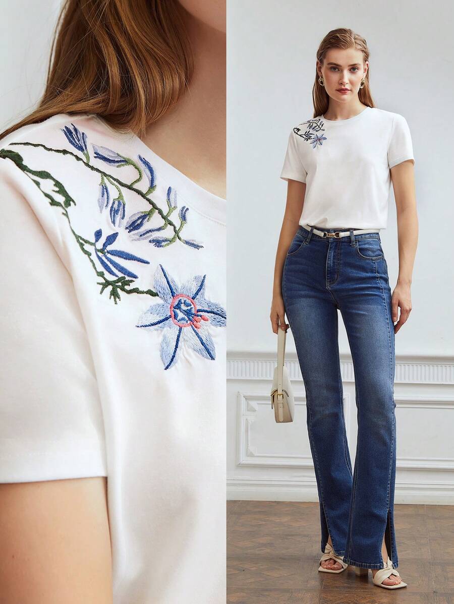 Blusa feminina casual chic com bordado floral assimétrico no ombro