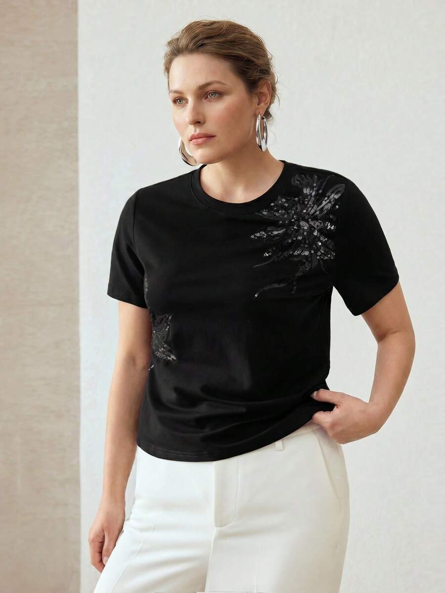 Blusa feminina preta 94% algodão com aplicação floral em paetês – Boutique do Encanto