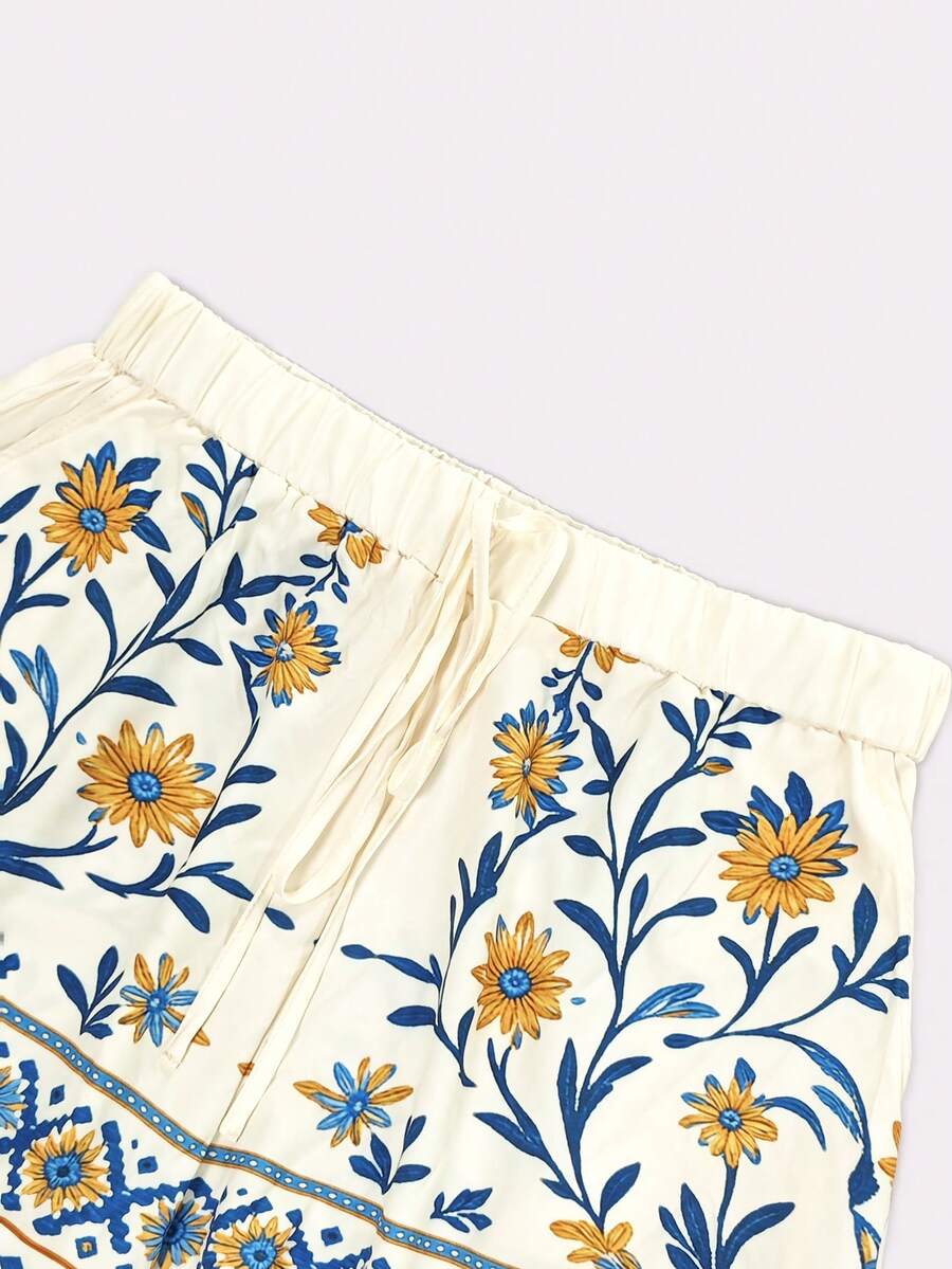Conjunto feminino floral azul com blusa e shorts – Boutique do Encanto 