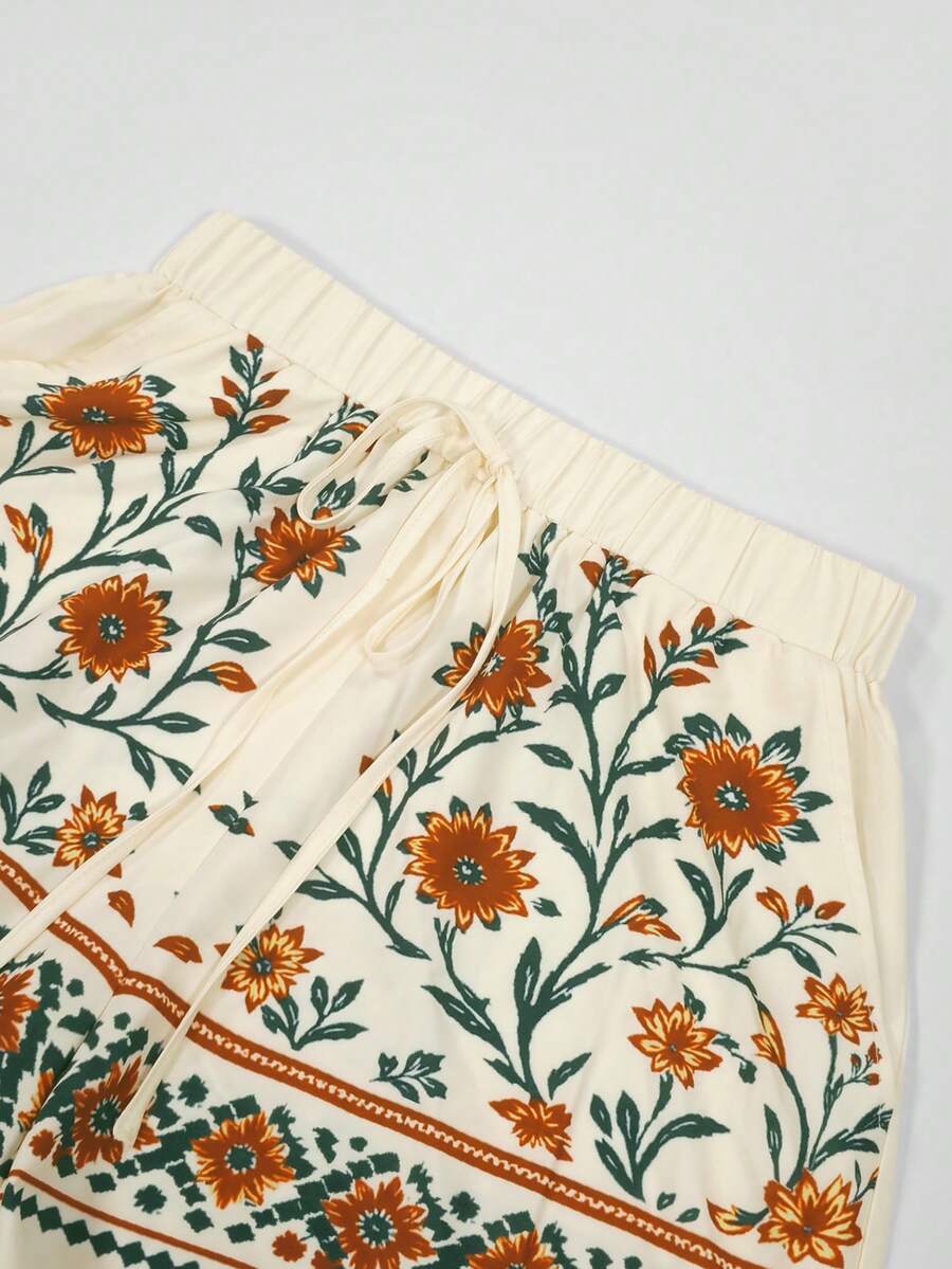 Conjunto feminino floral laranja com blusa e shorts – Boutique do Encanto