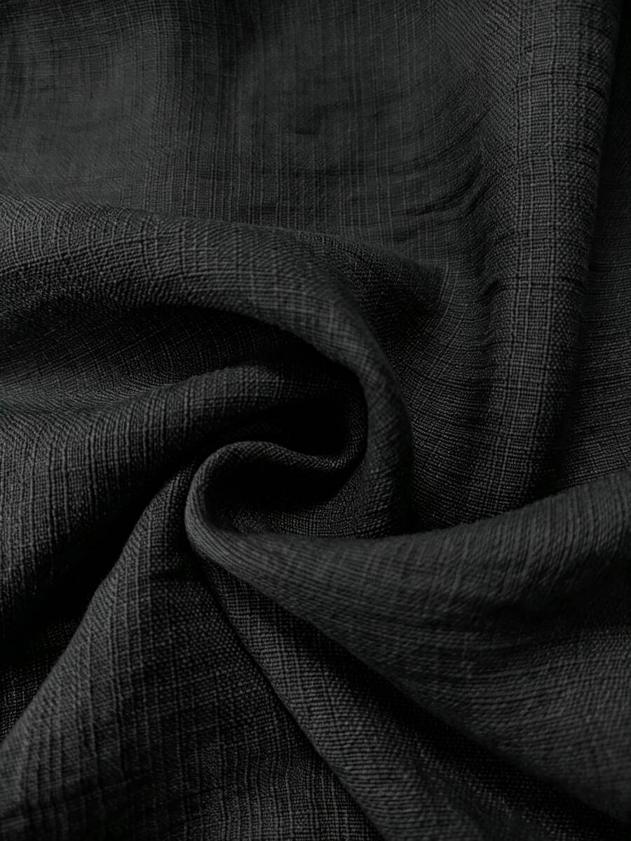 Detalhe da textura do tecido do conjunto feminino