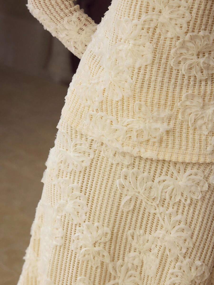 Look elegante feminino em tricô texturizado com manga longa