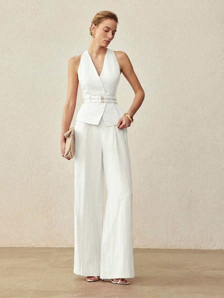 Look feminino elegante com colete estruturado e pantalona