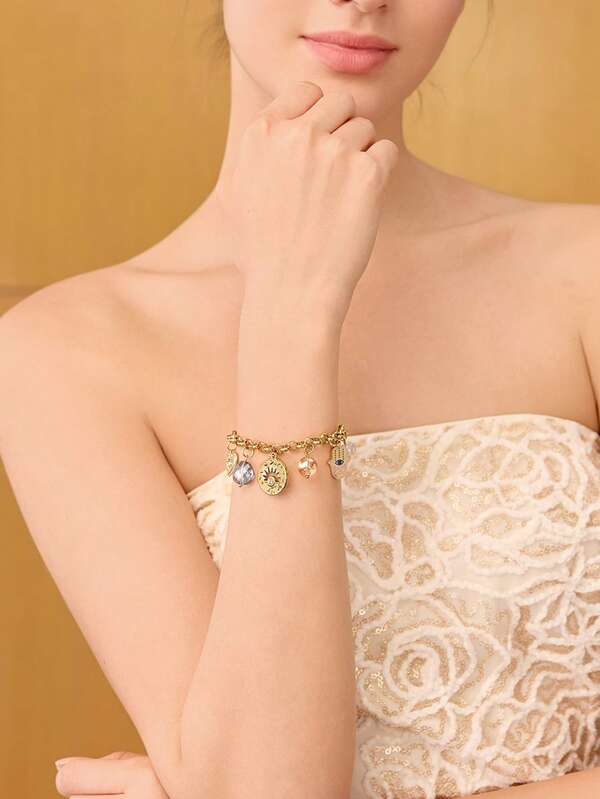 Pulseira Feminina Dourada com Charms Místicos em Aço Inox Banhada a Ouro 18 K - Semi Joia Fashion Premium - Boutique do Encanto Pulseiras 