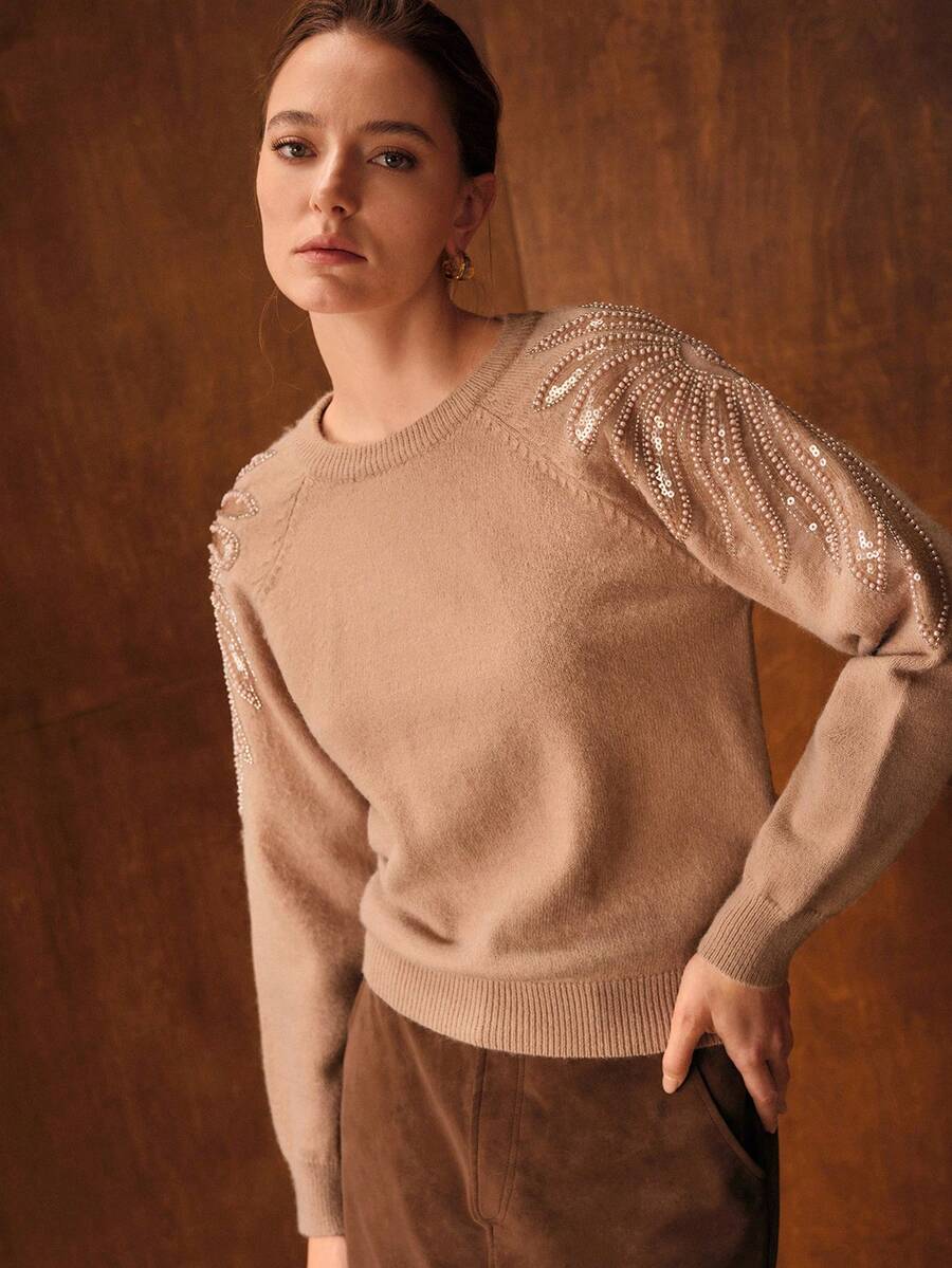 Suéter feminino casual chic com aplicações sofisticadas