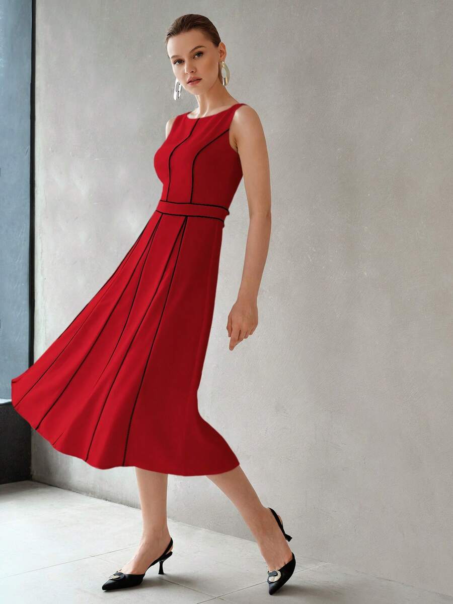 Vestido elegante para eventos com gola redonda e detalhes contrastantes
