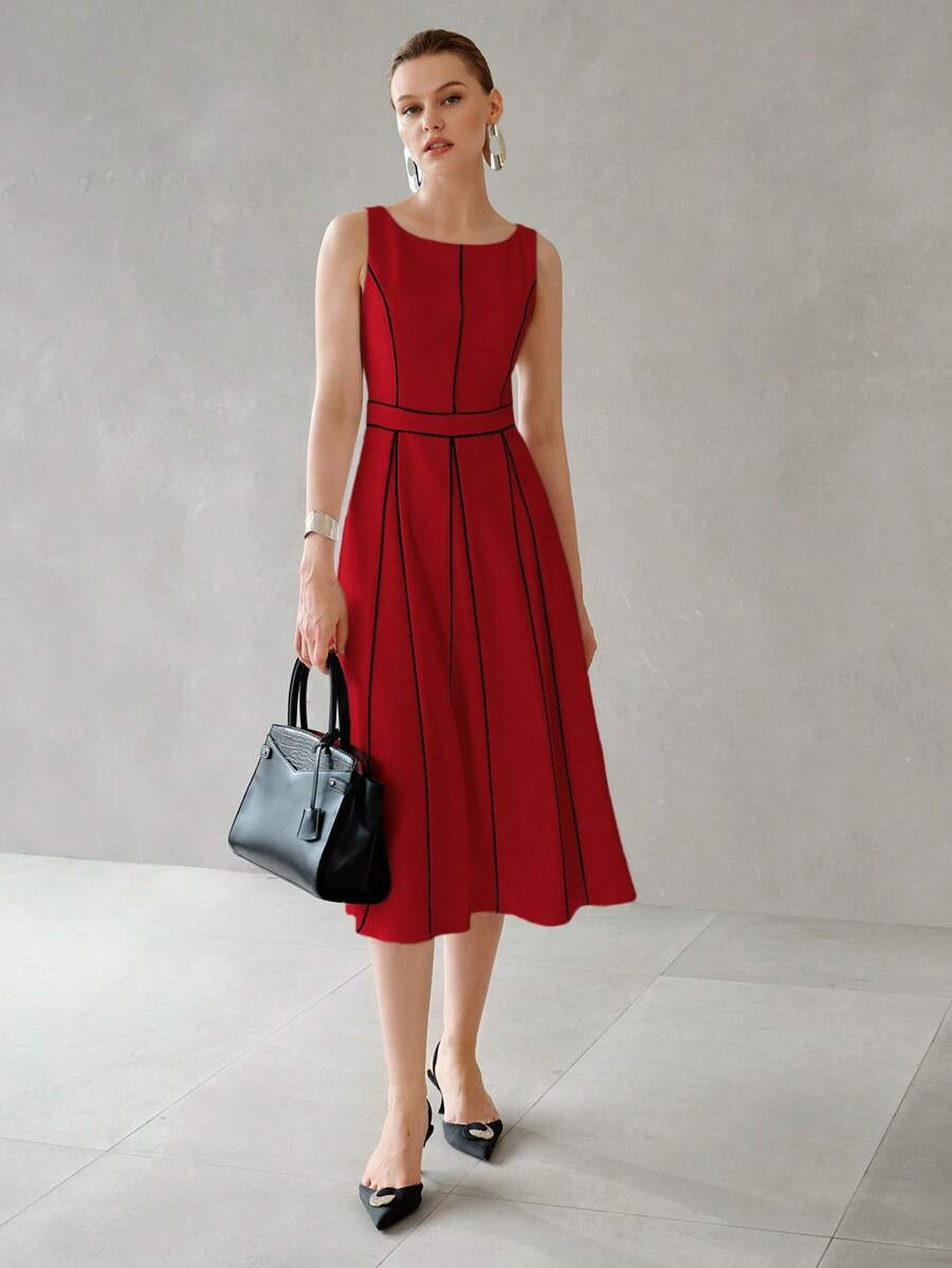 Vestido elegante para eventos com gola redonda e detalhes contrastantes