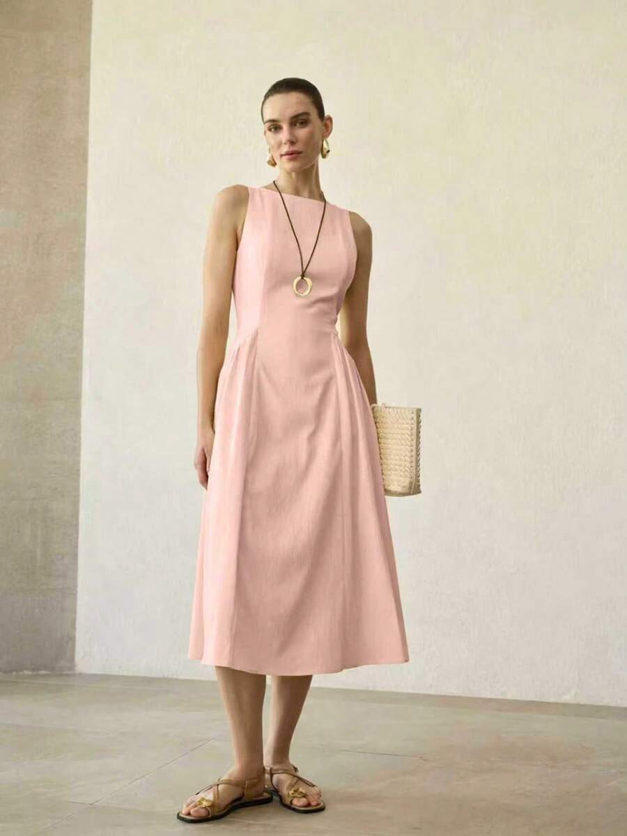 Vestido feminino midi evasê rosa suave com cintura alta
