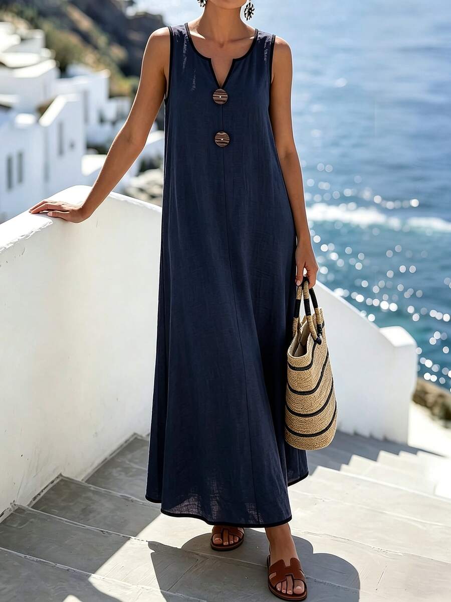 Vestido longo feminino azul-marinho com decote V entalhado, sem mangas, modelagem solta e detalhes frontais – Boutique do Encanto