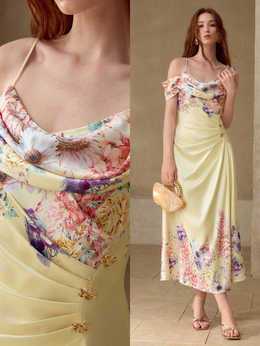 Vestido midi Baunilha Pastel com pregas laterais e pequenas aplicações decorativas na cintura.