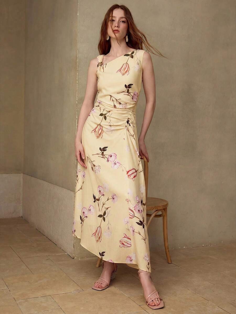 Vestido midi Off White Floral com cintura marcada e comprimento midi.