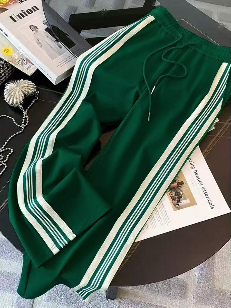 conjunto feminino esportivo chic verde com jaqueta e calça pantalona