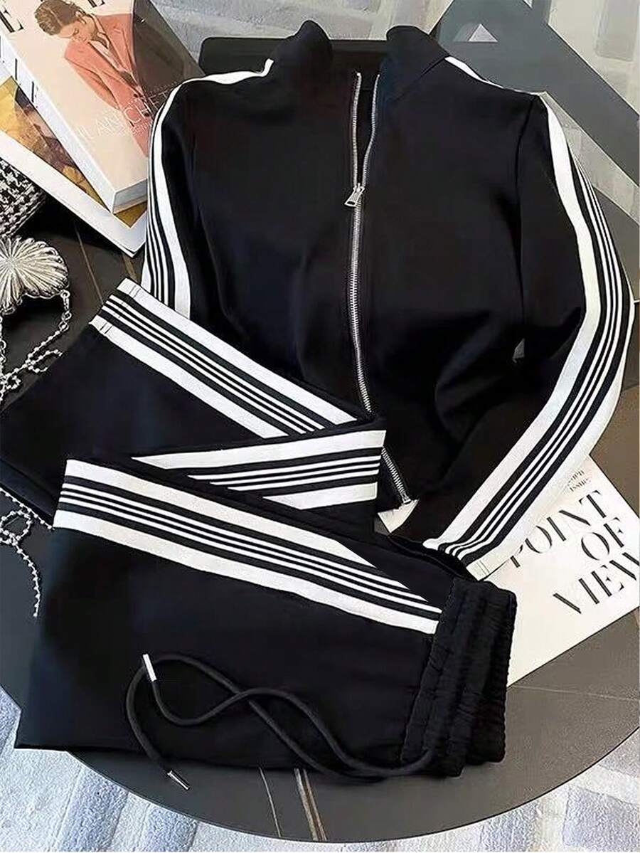 conjunto feminino na cor preta com listas brancas urbano moderno com calça pantalona