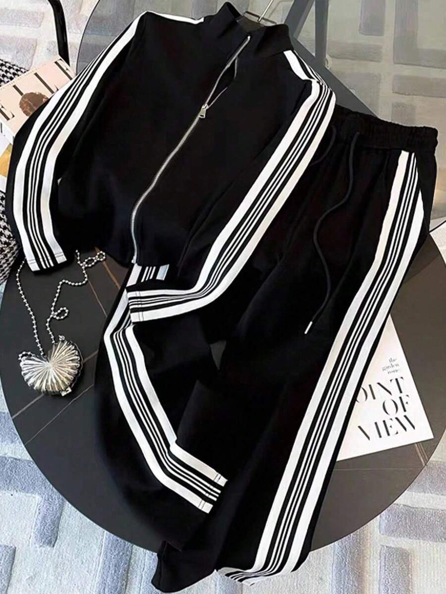 conjunto feminino na cor preta com listas brancas urbano moderno com calça pantalona