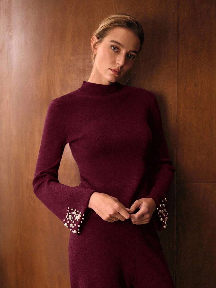 look feminino elegante em tricô com detalhes de pérolas nos punhos